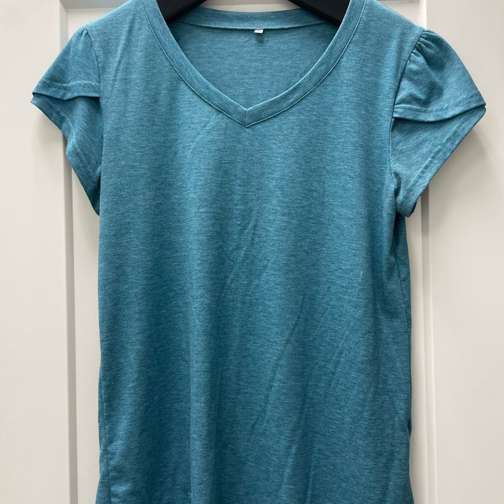 2 shirts for the price of ONE!
Teal V-Neck Women's Top